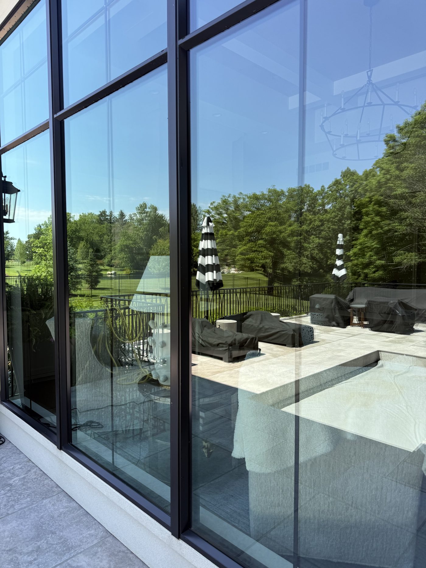 Window Cleaning — Floor-to-ceiling glass by JBL Exterior Pros, central Iowa